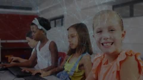 Diverse Students Typing on Computers in School Technology Class