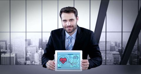 Business professional presenting digital heart health data