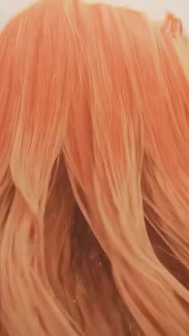 Redhead Woman Turning Head in Studio Showing Profile with Glasses Vertical Video