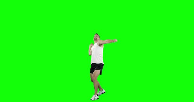 Man Exercising Against Green Screen, Throwing Sports Movement - Download Free Stock Images Pikwizard.com