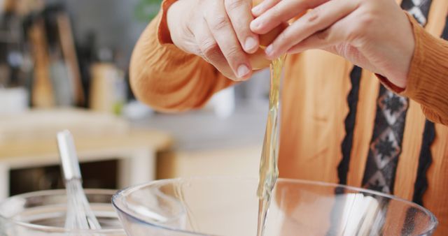 Person Consistently Cracking Egg into Mixing Bowl - Download Free Stock Images Pikwizard.com