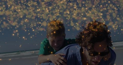 Father and Son Bonding at Beach with Magical Light Effect