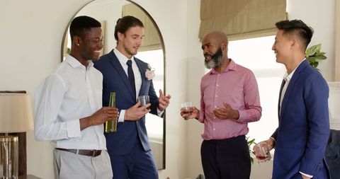 Friends celebrating together with drinks and laughter