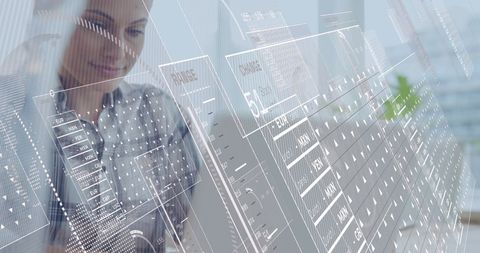 Businesswoman Analyzing Data on Laptop with Holographic Interface