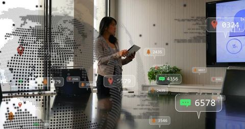 Chinese businesswoman checking tablet in high-tech boardroom with AR analytics overlays
