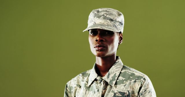 Confident Female Soldier in Camouflage Uniform - Download Free Stock Images Pikwizard.com