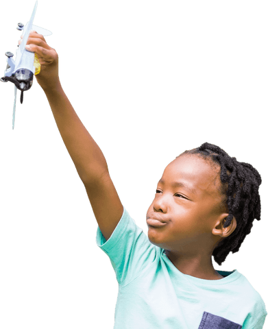 boy holding transparent toy airplane expressing imagination - Download Free Stock Videos Pikwizard.com
