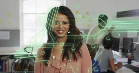 Businesswoman Leading Tech Innovation in Modern Office