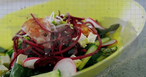 Vibrant beet spiral salad with asparagus radish and feta in lime bowl with map overlay