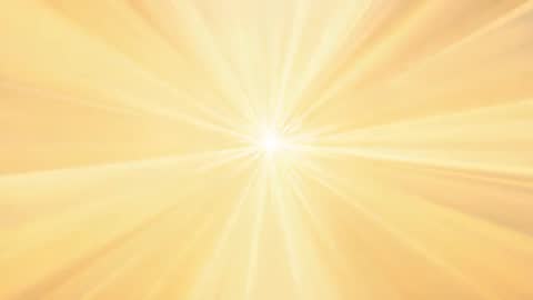 Golden Sunburst Looping Background Radiating Warm Rays, Sparkling Particles, Glow