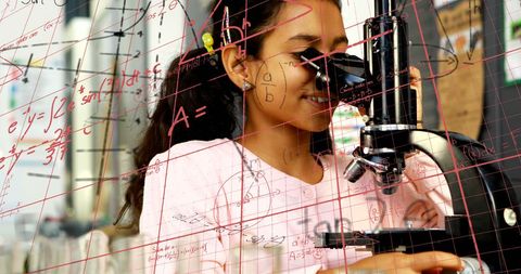 Young girl exploring science in school laboratory environment