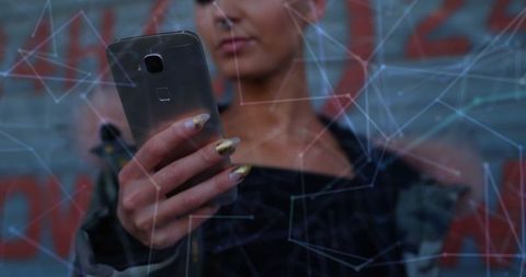 Woman Interacting with Smartphone and Digital Network