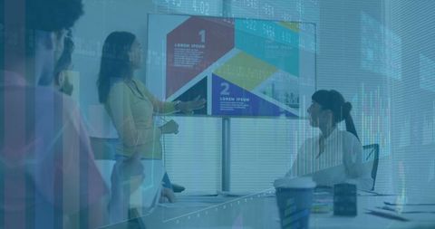 Businesswoman presenting infographic data in corporate meeting