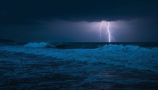 Dramatic Lightning Storm Over Ocean with Intense Energy