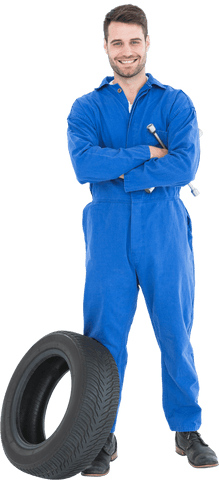 smiling mechanic in blue uniform standing by car tire transparent background - Download Free Stock Videos Pikwizard.com
