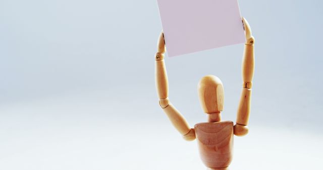 Wooden Mannequin Holding Blank Sign in Studio - Download Free Stock Images Pikwizard.com