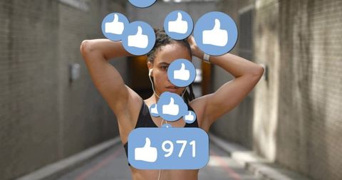 Urban athlete stretching and adjusting hair with earphones, surrounded by social likes 971