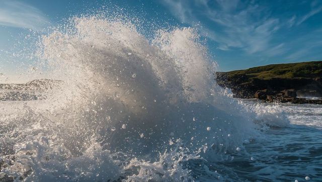 Dynamic Ocean Wave Crashing on Scenic Rocky Coastline