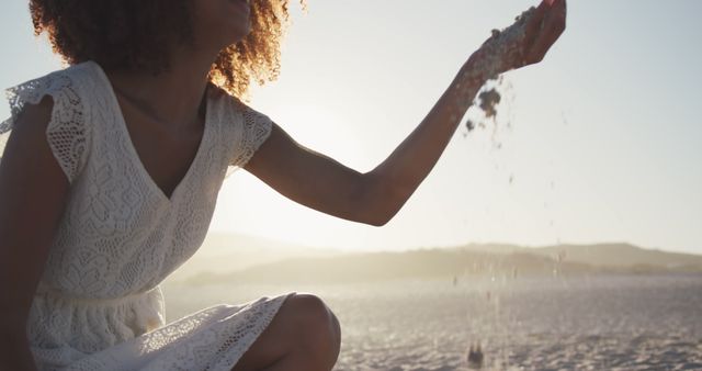 Young woman enjoying sunset at beach in summer - Download Free Stock Images Pikwizard.com