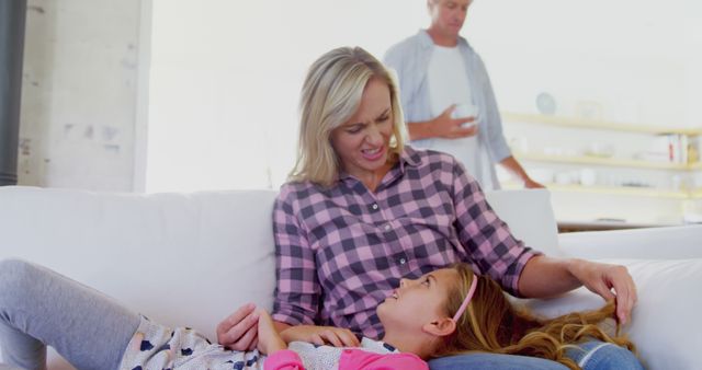 Mother Comforting Daughter While Father Watches - Download Free Stock Images Pikwizard.com