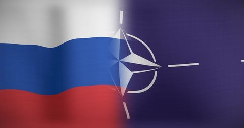 Russia and nato flags symbolizing tension