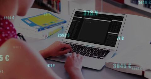 Teenage Girl Engaging in Financial Data Analysis on Laptop