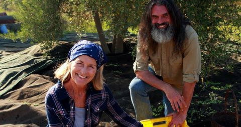 Smiling Teamwork in Sustainable Gardening Setting