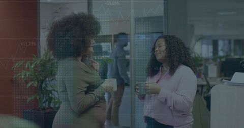 Financial Data Overlay on Businesswomen in Office Discussion