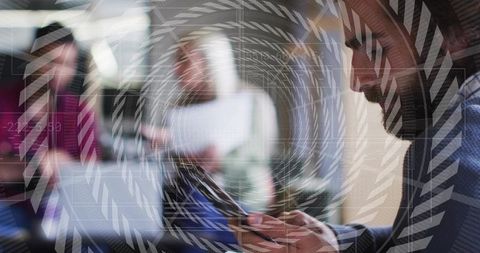 Man in blazer checking smartphone and tapping tablet with futuristic digital overlay