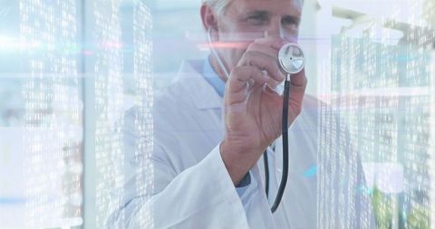 Senior doctor integrating medical technology in futuristic hospital