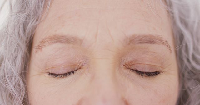 Closeup of Senior Woman with Closed Eyes and Gray Hair - Download Free Stock Images Pikwizard.com