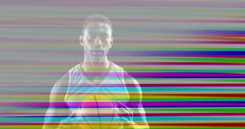 Holding basketball and standing amid vibrant glitch stripes, athletic portrait distortion