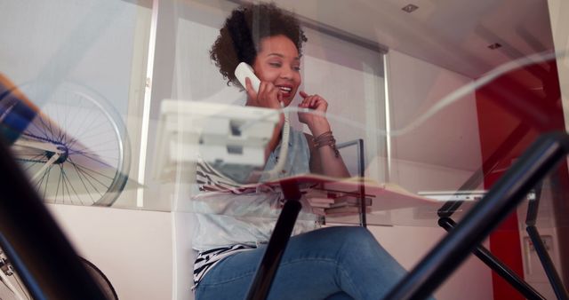 Businesswoman Speaking on Telephone in Modern Office - Download Free Stock Images Pikwizard.com