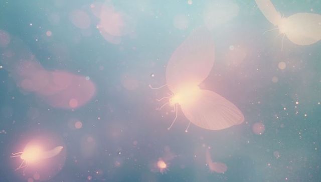 Magical glowing butterflies floating in ethereal dreamscape