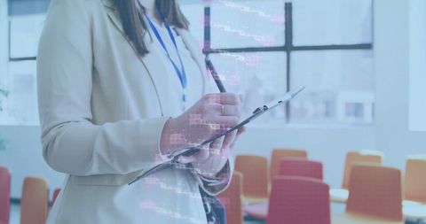 Female Executive Planning in Modern Training Room with Tech Overlay