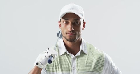 Young Golfer Posing Confidently in Sport Outfit