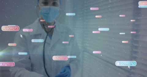 Clinician wearing mask and gloves interacting with augmented reality medical data overlay