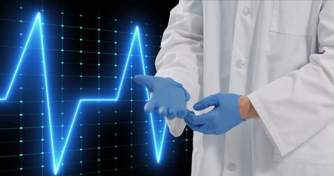 Doctor Prepared with Gloves and Digital Heartbeat - Download Free Stock Images Pikwizard.com