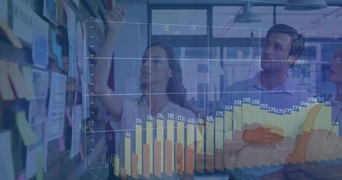 Innovative Business Team Analyzing Data with Digital Charts Overlay