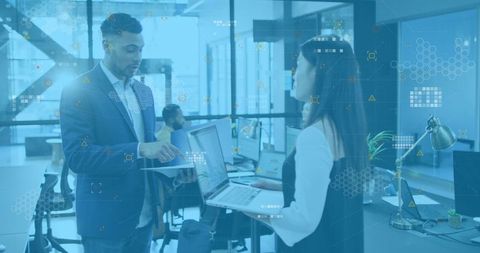 Diverse Team Discussing Digital Analytics in Modern Office