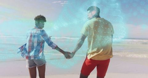 Couple Holding Hands on Beach with Holographic Graphic Overlay