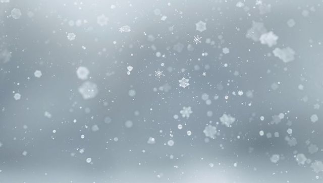 Drifting snowflakes with soft bokeh frost for winter background holiday design seasonal