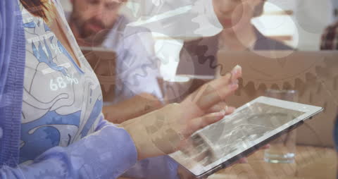 Business Team Discussing Projects With Digital Interface Overlay