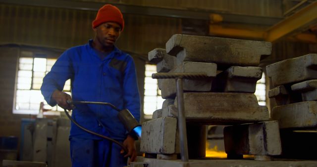 Manual Worker Using Propane Torch in Metal Workshop - Download Free Stock Images Pikwizard.com