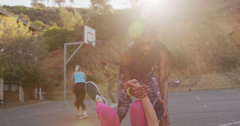 Female Basketball Players Engaging in Outdoor Game