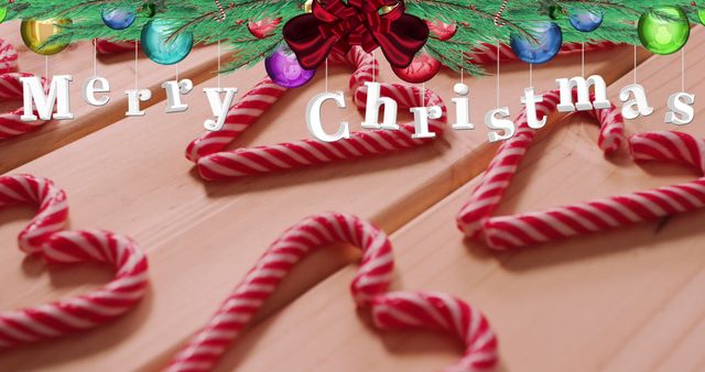 Festive Candy Canes on Wood with Merry Christmas Text - Download Free Stock Images Pikwizard.com