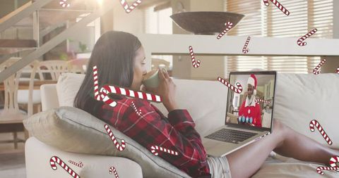 Woman enjoying virtual christmas call with holiday spirit