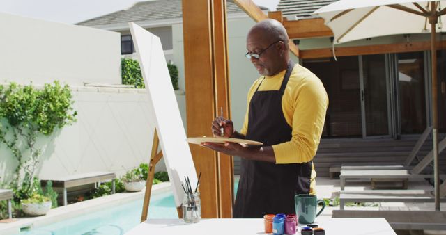 Man Painting Outdoors in Relaxing Environment - Download Free Stock Images Pikwizard.com