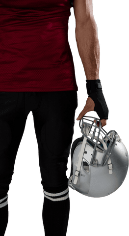 Transparent image of football player holding helmet by side