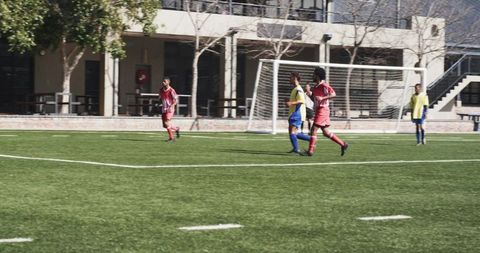 Teen Soccer Players Competing in Vigorous School Match